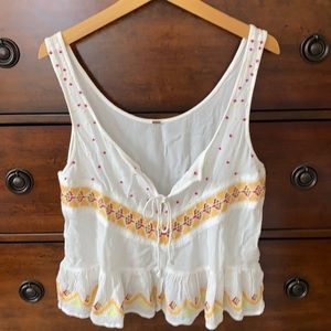 Free People embroidered flowy sleeveless crop top
